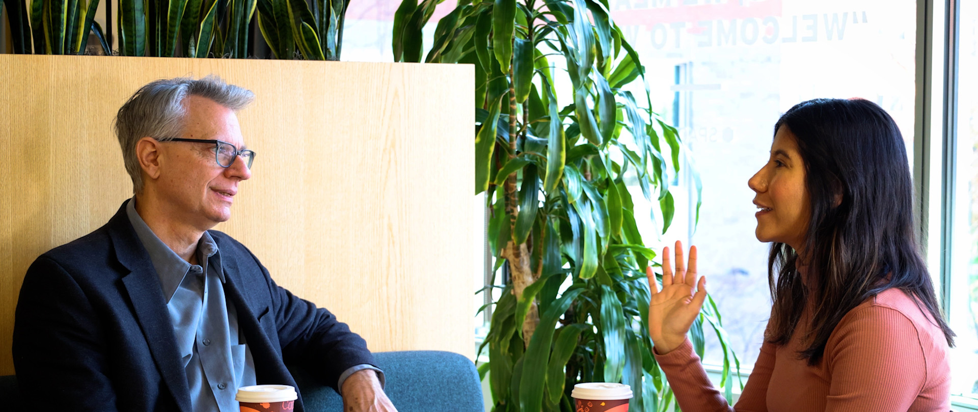 Leadership coach meeting with a client during a one on one executive coaching session